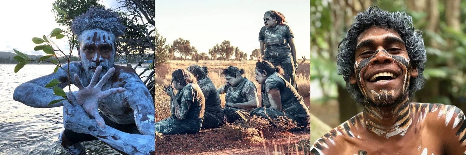 Three Carriberrie stills: a painted dancer holding a branch by the water, a group of women in body paint gathered on red earth, and a smiling painted performer among trees