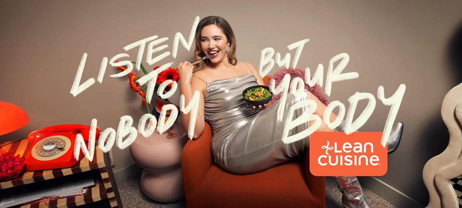 Lean Cuisine key visual: a woman in a silver dress eats from a bowl beside the words Listen to nobody but your body