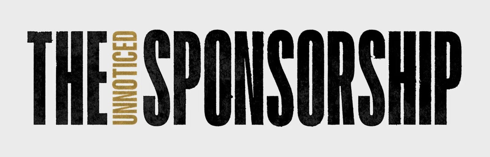 The Unnoticed Sponsorship logo, with the word Unnoticed set small and sideways in gold between The and Sponsorship
